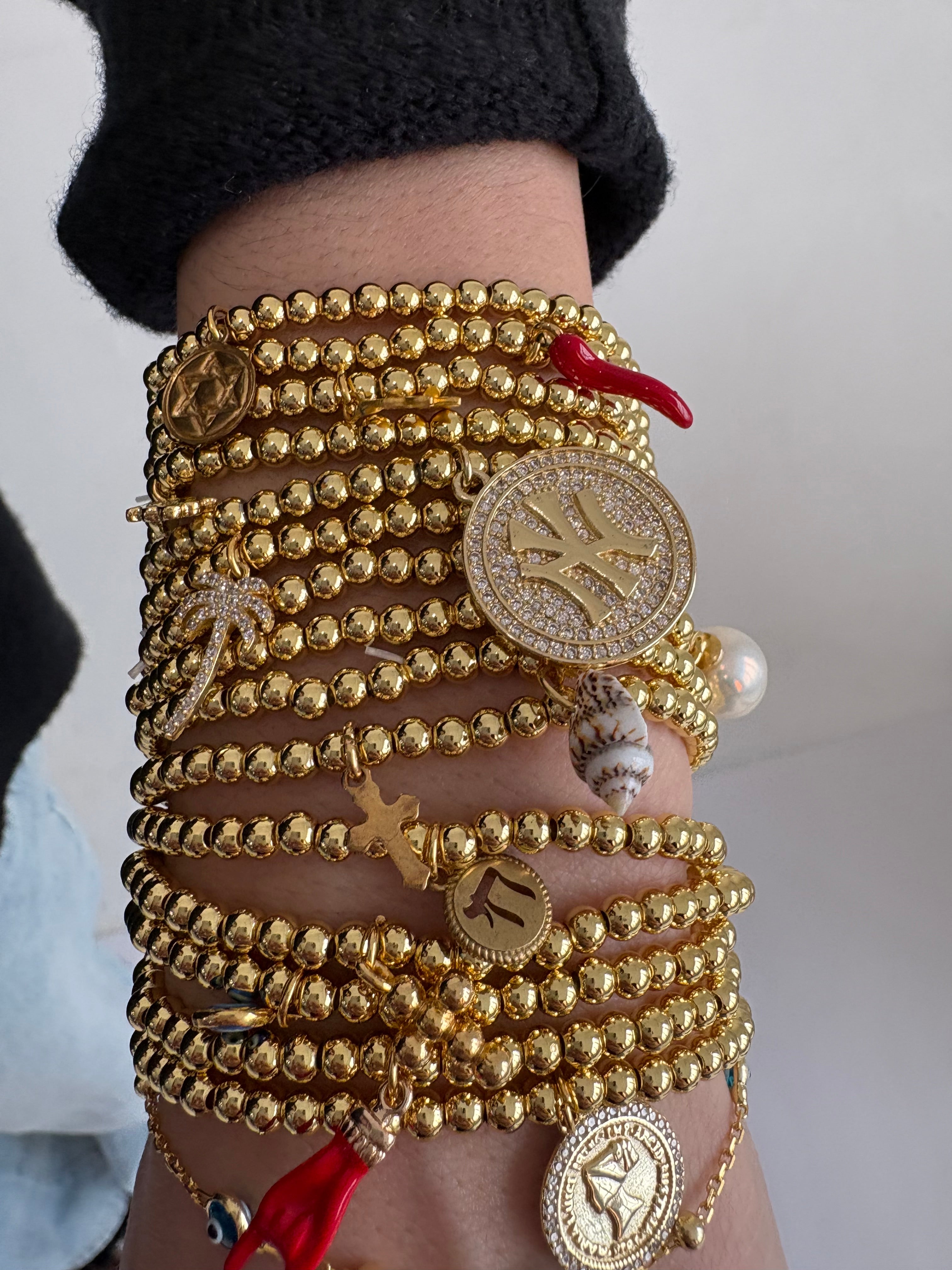 Gold NY Pendant Beaded Bracelet