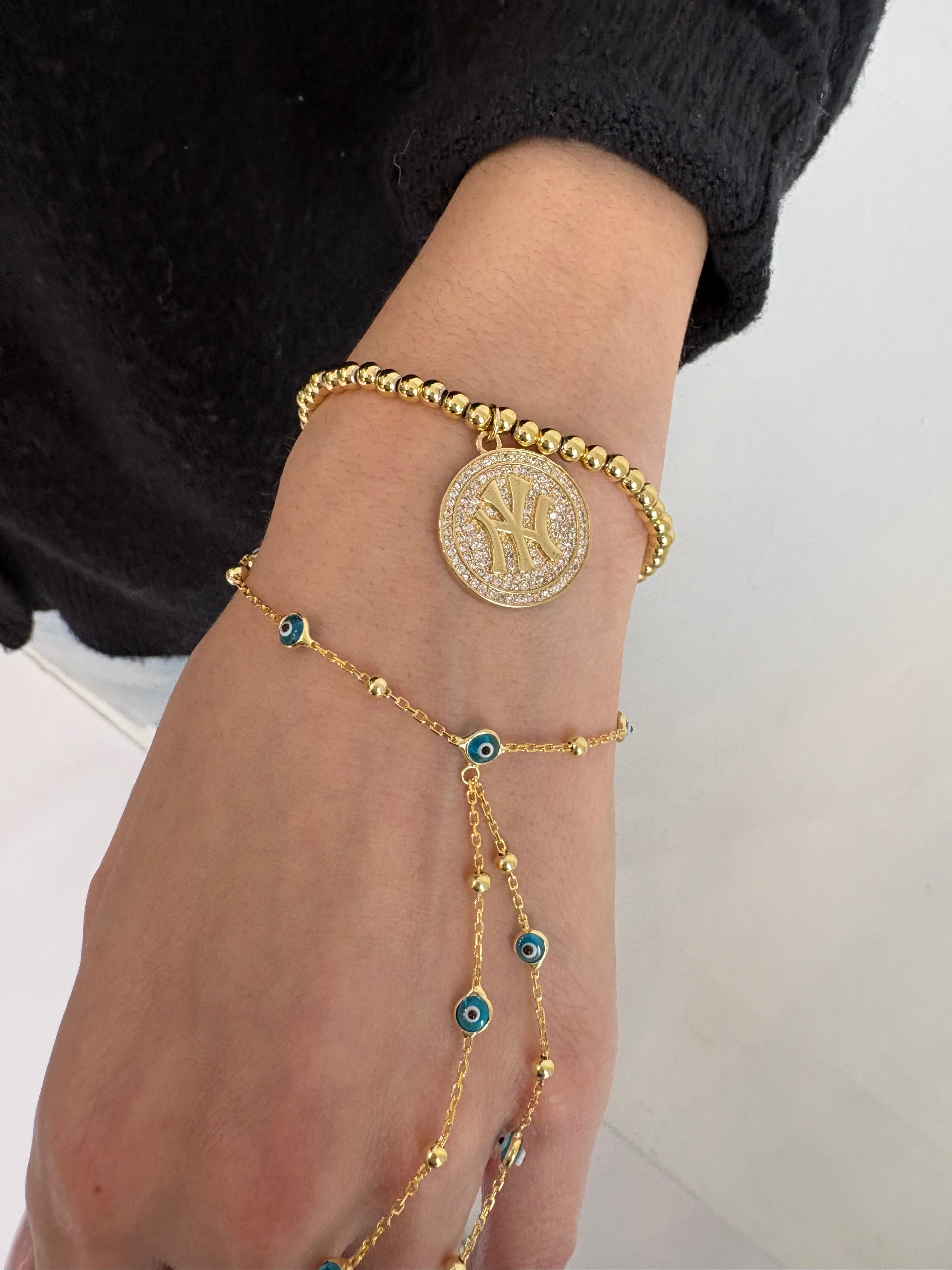 Gold NY Pendant Beaded Bracelet